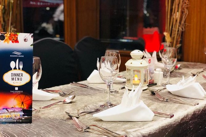 Dubai Marina Dinner Cruise with Live Music & Open Bar - Deck choice: upper open-air vs lower glass dining