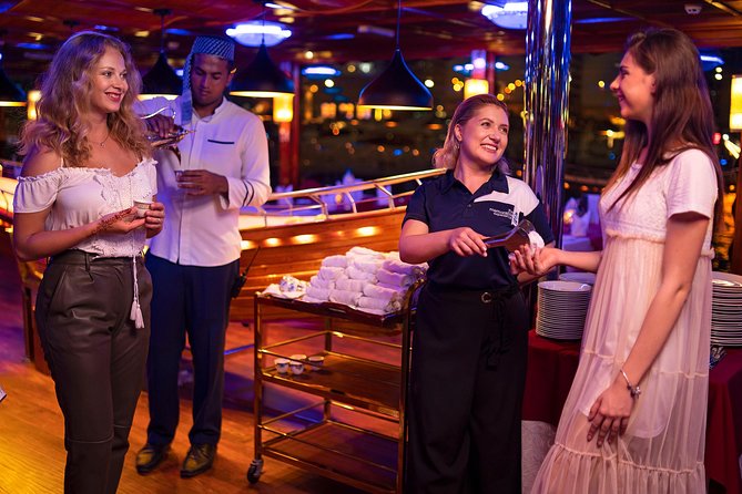 Dubai Marina: Luxury Dhow Dinner Cruise with Hotel Transfer - Dinner setup: international buffet, desserts, and vegetarian requests