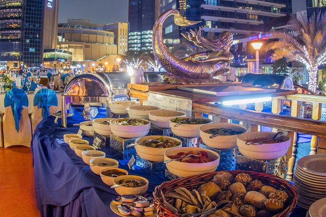 Dubai Marina: Luxury Dhow Dinner Cruise with Hotel Transfer - Getting the best photos: top-deck views versus downstairs seating
