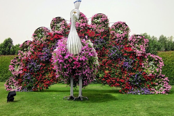 Dubai Miracle Garden Entry Tickets - Smurfs Village, mushroom houses, and theme zones that make it feel like a playground