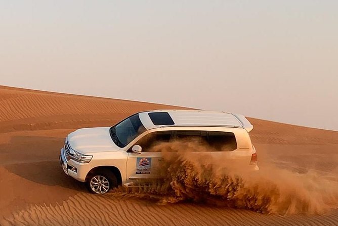 Dubai Morning Desert Safari: Camel Ride & Sandboarding! - Dune bashing for about 35 to 40 minutes, with that bigger thrill window