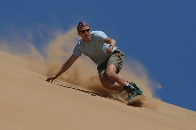 Dubai: Morning Desert Safari with Camel Ride and Sand boarding - Hotel pickup, timing windows, and what the ride is like