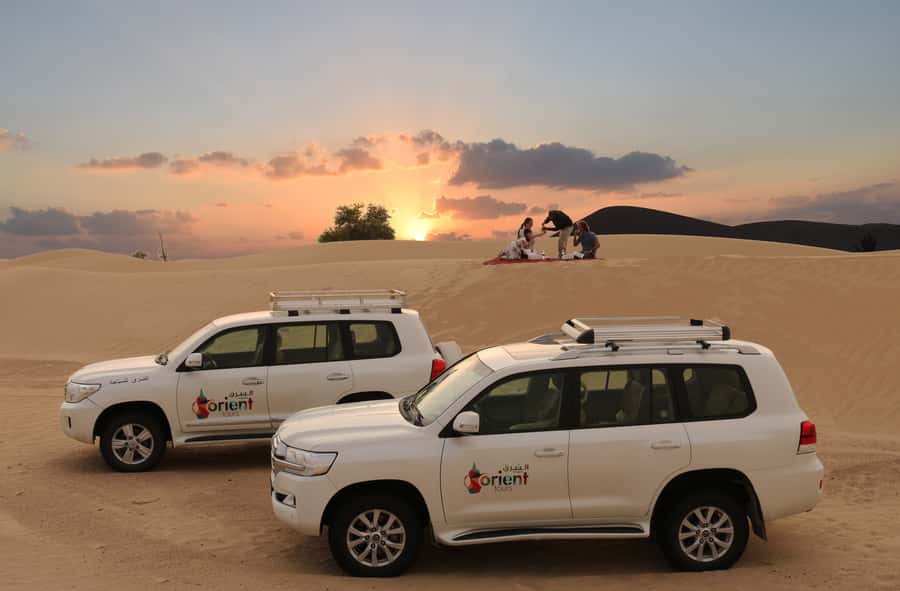 Dubai: Morning Desert Safari with Camel Ride & Sandboarding - Morning pickup and the easy drive out of Dubai