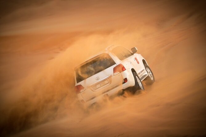 Dubai Morning Desert Safari with Quad Biking & More Activities - Quad biking in the fenced area: fun, controlled, and worth planning for