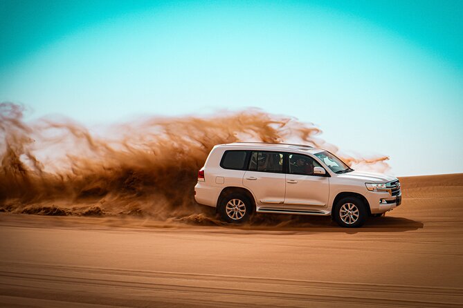 Dubai Morning Evening Desert Safari,Sand boarding and Camel ride - Dune bashing in the high red dunes, the thrill and how to enjoy it safely