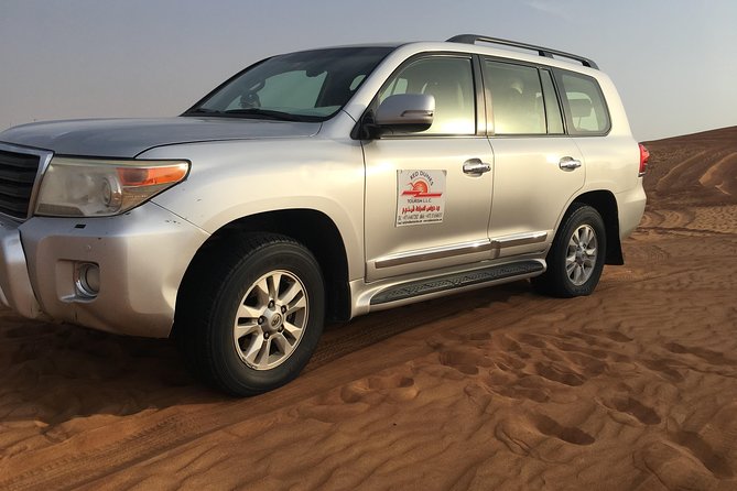 Dubai Morning & evening Desert Safari Tours - Dune drive, sandboarding, camel riding: the core desert circuit