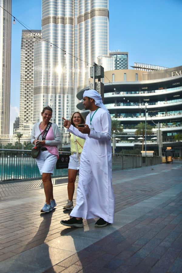 Dubai: Old City Walking Tour with Abra Ride - Reaching the Creek: Views, Dhow Boats, and the Abra Moment