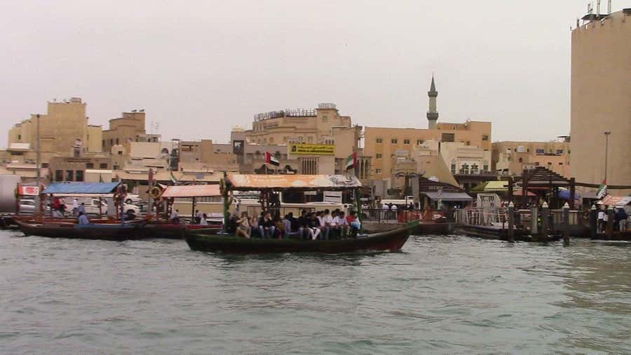 Dubai: Old City Walking Tour with Abra Ride - Gold Souk: The Flashy Stop With Real Cultural Context