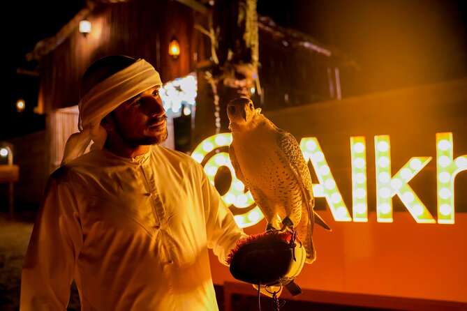 Dubai Overnight Desert Safari, BBQ & Stargazing at Al Khayma Camp - Evening entertainment: Tanoura and Ladies Khaliji dance in a desert camp setting