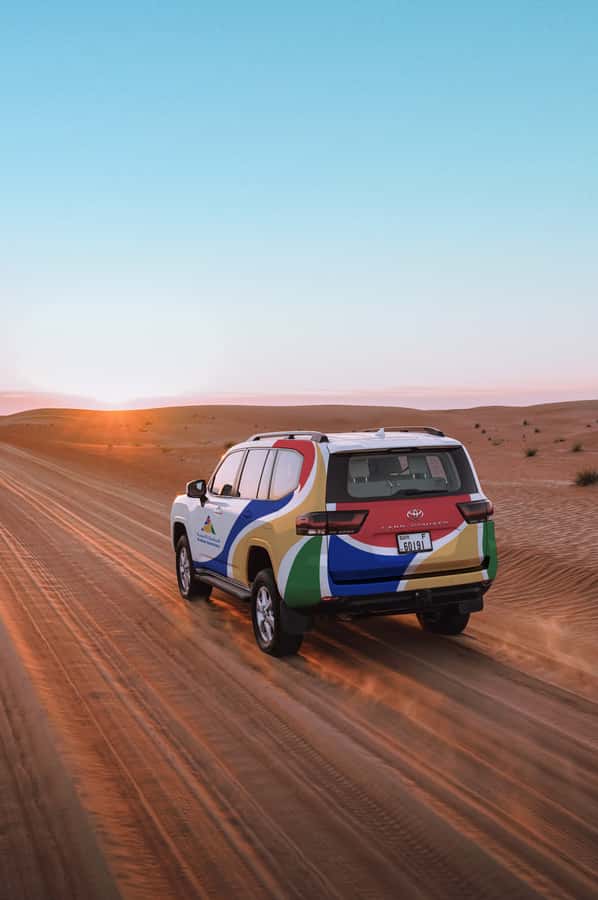 Dubai: Premium Desert Safari, Camel Ride, BBQ & Sandboarding - Desert dunes, but make it an organized premium evening