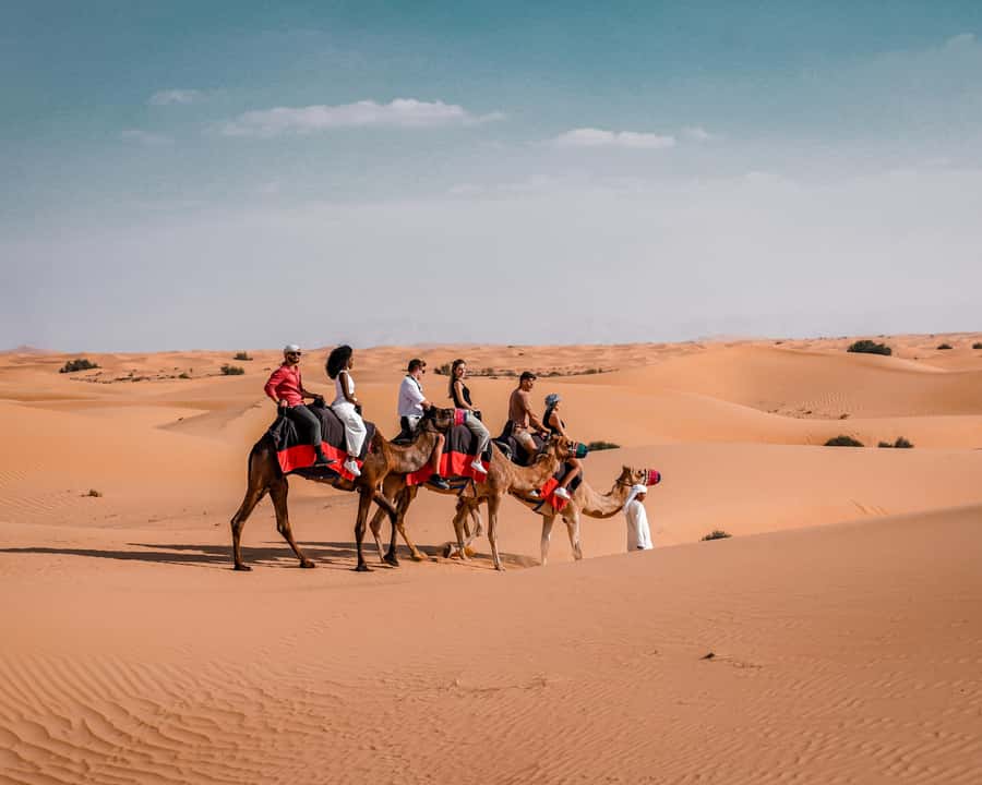 Dubai: Premium Desert Safari, Camel Ride, BBQ & Sandboarding - The premium Bedouin camp experience: welcome drinks, seating, and vibe