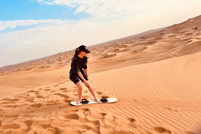 Dubai Premium Desert Safari Red Duns Camel sandbord & Premium BBQ - Entertainment Under the Stars: Belly Dance, Tanora, Fire Shows