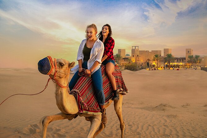 Dubai Premium Evening Desert Safari ATVs, Dinner & Shows - Dune bashing in an AC Landcruiser, the adrenaline portion