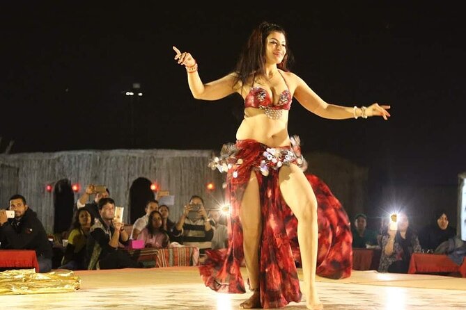 Dubai Premium Evening Desert Safari ATVs, Dinner & Shows - Dinner with live BBQ, Tanoura, fire, and Ladies Khaliji dance