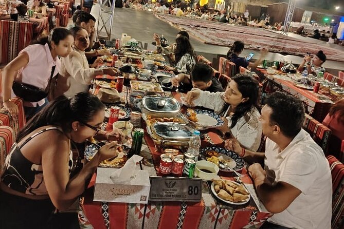 Dubai Premium Red Dunes Safari Camel Ride and BBQ Dinner - BBQ dinner and live shows: what the night feels like
