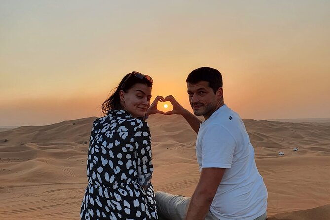 Dubai Premium Red Dunes Safari Camel Ride and BBQ Dinner - The desert camp experience: Arabic coffee, henna, shisha, and traditional dress
