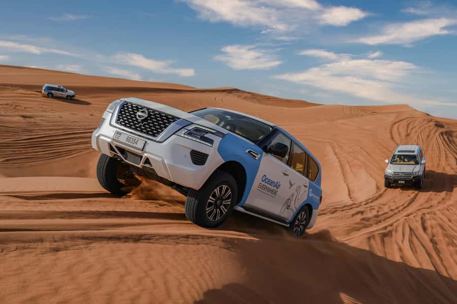 Dubai: Premium Safari, Camel Ride & Al Khayma Camp 3-Buffets - Pickup, small-group comfort, and the ride out of the city
