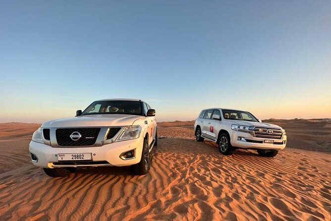 Dubai Private 4x4 Car Desert Safari with Dinner, Camel, and Show - Belly Dancing, Fire Show, and Tanoura Under Arabian Nights