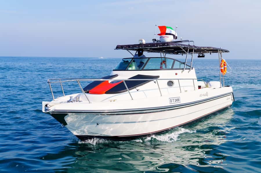 Dubai: Private Coastline Landmarks Mini-Yacht Tour - Burj Al Arab from the water: the sail-shaped finale