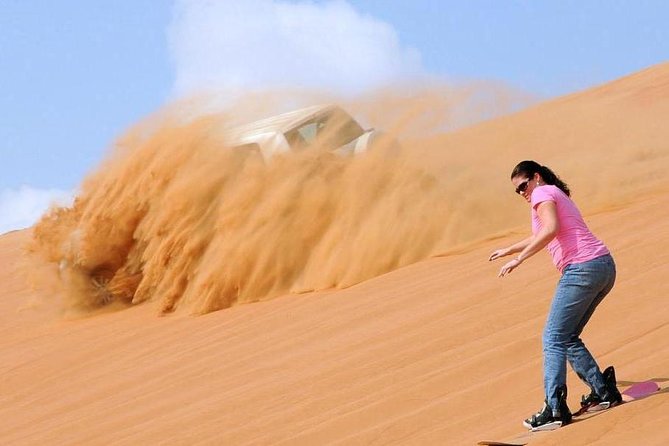 Dubai Private Morning Desert Safari: Camel Ride & Sandboarding - The dune peak photo stop and the sunrise moment