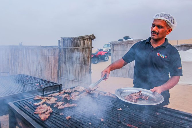 Dubai Private Premium Desert Safari with BBQ Dinner in 4WD - Camel farm stop and sandboarding: hands-on, not just watching