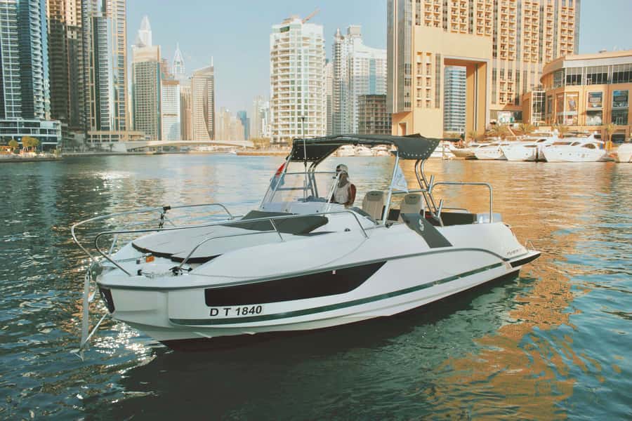Dubai: Private Sea Escape Cruise - Swim, Tan & Sightsee - 1-hour route: Dubai Marina, JBR, and Dubai Eye at a relaxed pace