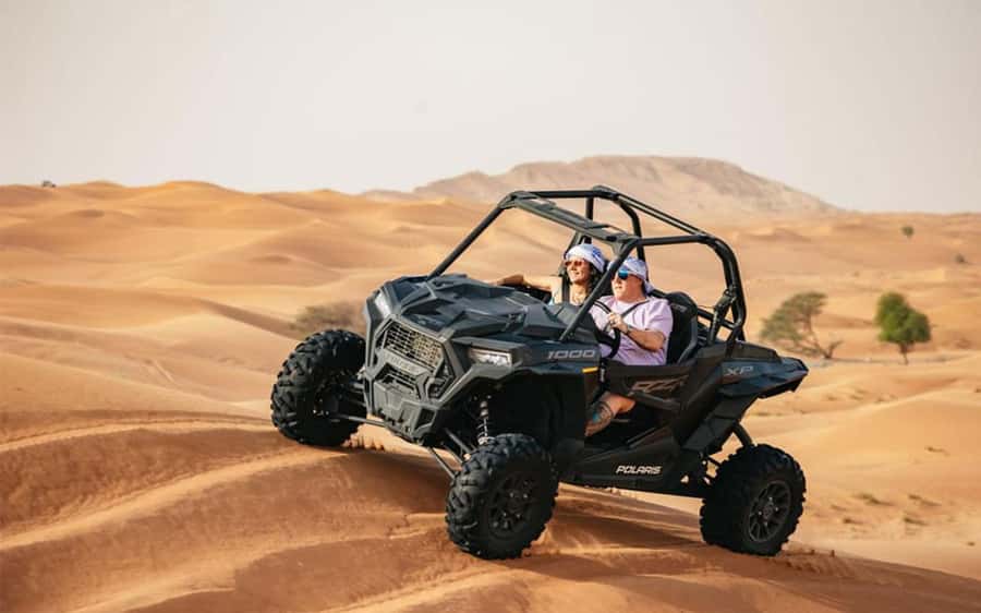 Dubai: Quad Bike, Dune Buggy, and Sandboarding Experience - Sandboarding in Dubai: What It Feels Like and How to Get More Runs