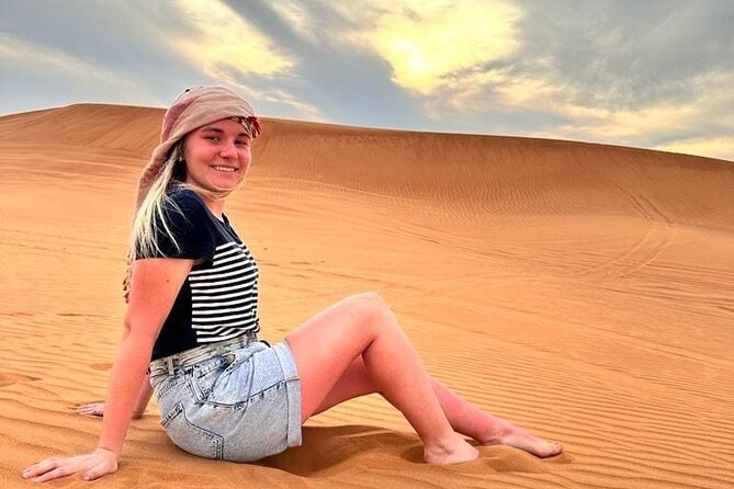 Dubai Red Desert Safari sharing basis with Camel, Shows & Dinner - Camel rides and henna at the Bedouin camp
