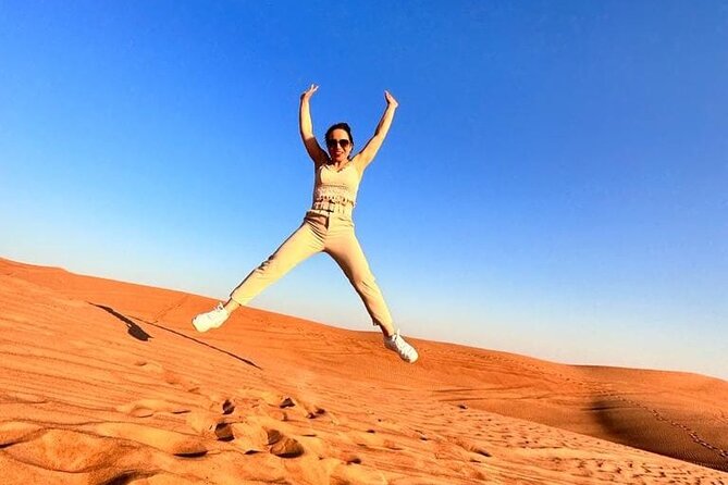 Dubai Red Desert Safari sharing basis with Camel, Shows & Dinner - Dinner plus Tanura, belly dancing, and fire show