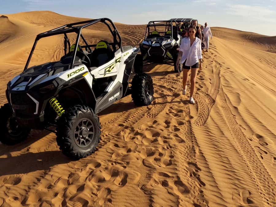 Dubai: Red Dune Desert, Dune Buggy Ride & BBQ Buffet Dinner - Sandboarding, Camel Ride, and Sunset Photo Stops