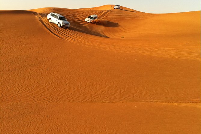 Dubai Red Dune Extreme Desert Safari Adventure With Sand Boarding - The sandboarding stop: 15 minutes at the top, then sliding time
