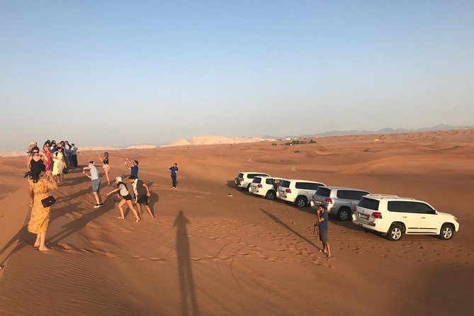 Dubai Red Dune Extreme Desert Safari Adventure With Sand Boarding - Group size up to 100: how it affects the vibe