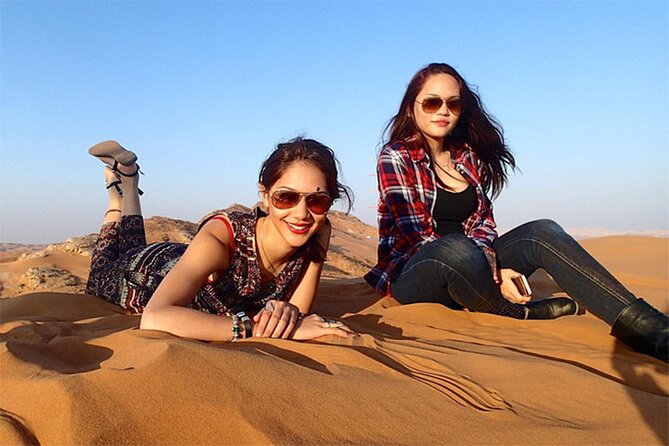 Dubai Red Dune Safari with BBQ Dinner and Live Shows - Sunset Thrills: Sandboarding and Camel Riding