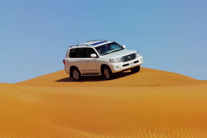 Dubai Red Dune Safari with BBQ Dinner & Live Shows from RAK - The desert camp program: photos, henna, tea, and the local costume moment