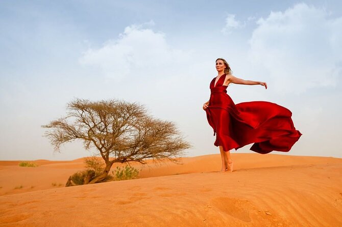 Dubai: Red Dunes Desert Safari, Camel ride, Sandboard, Quad Bike - Hotel Pickup, Air-Conditioned Comfort, and a Real Guide in Your Vehicle