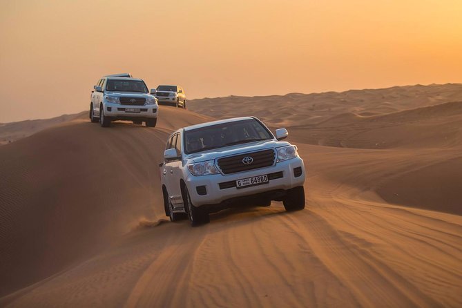 Dubai Red Dunes Desert Safari : Sandboarding, BBQ & Live Shows - Air-Conditioned Shared Pickup From Anywhere in Dubai