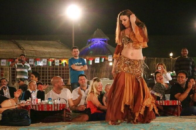 Dubai Red Dunes Desert Safari, With BBQ, Camel Ride, Sand Boarding And Much More - Arriving at the Bedouin camp: welcome drinks and Arabic dress photos
