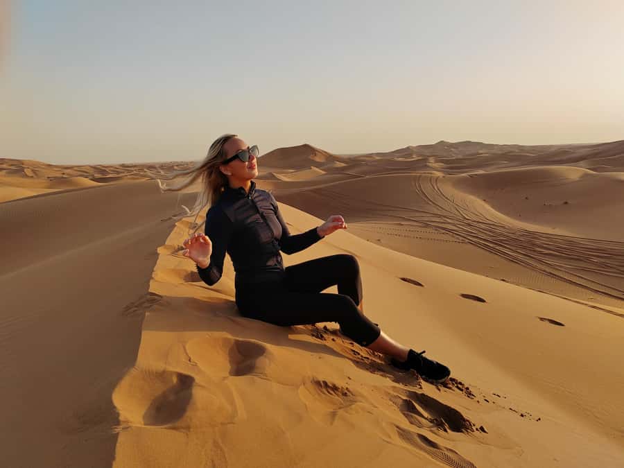 Dubai: Red Dunes Desert Safari with Premium Camp BBQ & Shows - Arriving at the premium desert camp: gahwa, henna, and dress-up photos