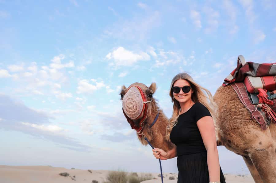 Dubai: Red Dunes Quad Bike, Dune Buggy, Camel & Refreshments - Sandboarding: The Best Photo-to-Effort Ratio