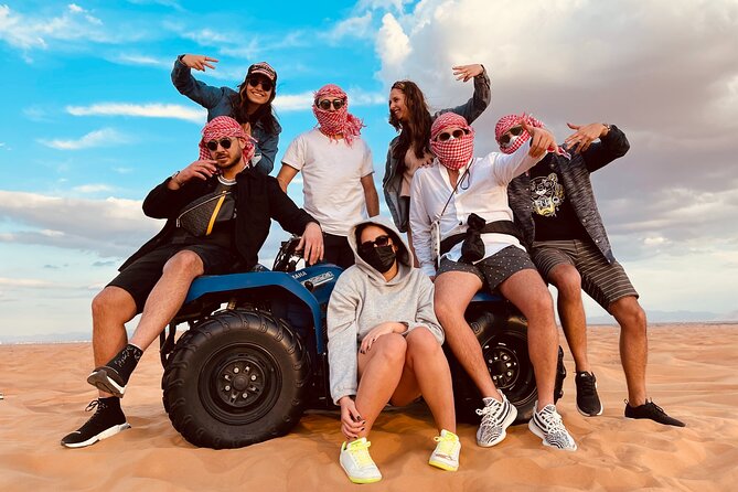 Dubai Red Dunes Quad Bike Tour,Sandboard, Camel ride & BBQ Dinner - Key Highlights You Can Count On