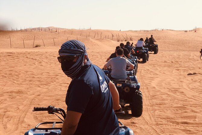 Dubai Red Dunes Quad Bike Tour,Sandboard, Camel ride & BBQ Dinner - Sandboarding and Camel Ride: Two Ways to Feel the Desert