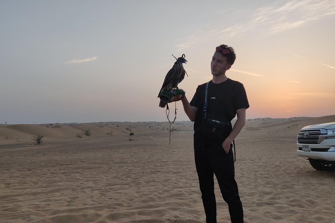Dubai Red Dunes Quad Bike Tour,Sandboard, Camel ride & BBQ Dinner - BBQ Dinner With Belly Dance, Tanura, and a Fire Show