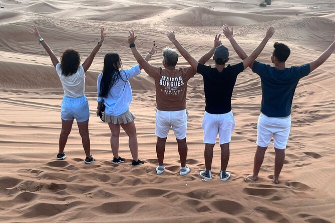 Dubai Red Dunes Safari, ATV, Camel ride, BBQ at Desert Camp - Live Shows at Dinner: Tanoura, Belly Dance, and Fire