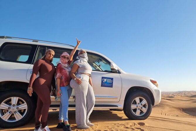 Dubai Red Dunes with Sandboarding, Camel Ride, Falcon & VIP Camp - The BBQ Buffet, Unlimited Drinks, and Shisha Timing