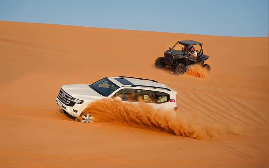 Dubai: Sandboarding, Camel Ride and Red Dune Bashing - Into The Desert: Pickup, Ride Time, and What You’ll Feel First