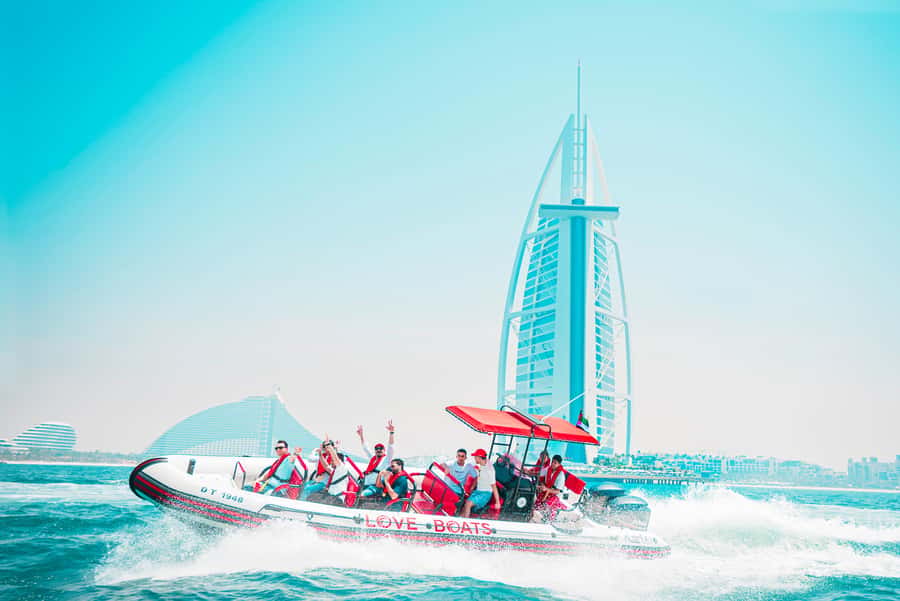 Dubai: Sightseeing Speedboat Tour with Live Tour Guide - Meeting point reality: finding Love Boats UAE at the marina