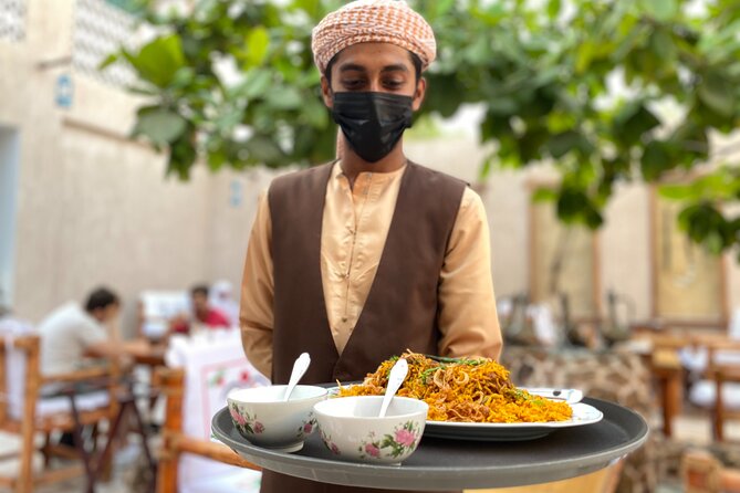 Dubai Souks, Food & Culture Walking Tour - Spice Souk stop: sweet milky tea and the back-alleys feel