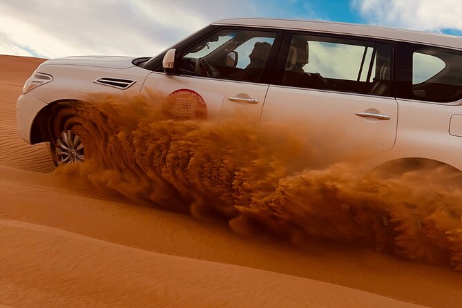 Dubai Sunrise Desert Safari Red Dune Camel Falcon & Sandboarding - First Light in Lahbab Red Dunes: The real point of a sunrise safari