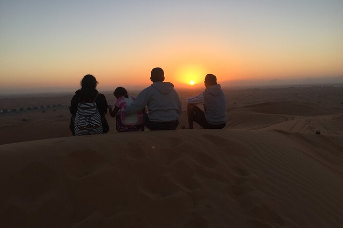 Dubai Sunrise Desert Safari Red Dune Camel Falcon & Sandboarding - Sandboarding on high dunes: where you feel the slope