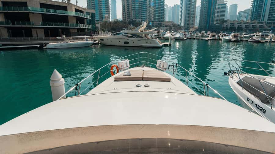 Dubai: Sunset & Night Cruise with Bites and Drinks - Crew, music, and the on-board vibe you can expect